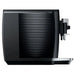 Jura E8 residential automatic coffee machine in black, side view showing the ribbed side panel and coffee spout