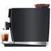 Jura GIGA 10 residential automatic coffee machine in black, left side view with bean hopper and a glass of coffee