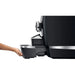 Jura GIGA X8 commercial automatic coffee machine, hand removing the drip tray from the front of the machine