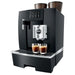 Jura GIGA X8C commercial automatic coffee machine in black, angled view brewing two espressos on the drip tray