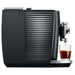 Jura J8 twin residential automatic coffee machine, side view showing ribbed panel with a glass of coffee