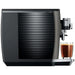 Jura S8 residential automatic coffee machine, side view showing the ribbed black side panel and coffee spout
