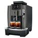 Jura W8 commercial automatic coffee machine in dark inox, angled right view brewing two espressos
