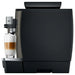 Jura W8 commercial automatic coffee machine, opposite side view with a latte macchiato under the milk spout