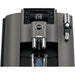 Jura W8 commercial automatic coffee machine, close-up of the Coffee Eye display and spout over a glass