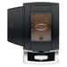 Jura X10 commercial automatic coffee machine, top view of the bean container filled with coffee beans