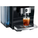 Jura Z10 residential automatic coffee machine, close-up of the spout dispensing iced coffee into a glass