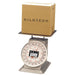 Kilotech KAM Series receiving scale with dial face, shown weighing a cardboard shipping box on the platform