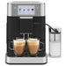 KitchenAid KESMC milk container attached to a black automatic espresso machine brewing two lattes