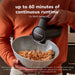 KitchenAid KHMR762BM cordless hand mixer in use mixing batter, graphic noting up to 60 minutes of runtime