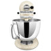 KitchenAid KSM150PSAC Artisan 5 quart tilt-head stand mixer in almond cream with polished bowl, front view
