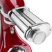 KitchenAid KSMPSA stainless steel pasta roller attachment, close-up of the rollers mounted on a stand mixer