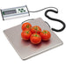 LEM 1167 330 lb stainless steel shipping scale with platform, corded digital display and tomatoes being weighed