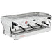 La Marzocco PB-AV-4-GR four group espresso machine, angled view of the stainless steel body and raised cup warmer rail