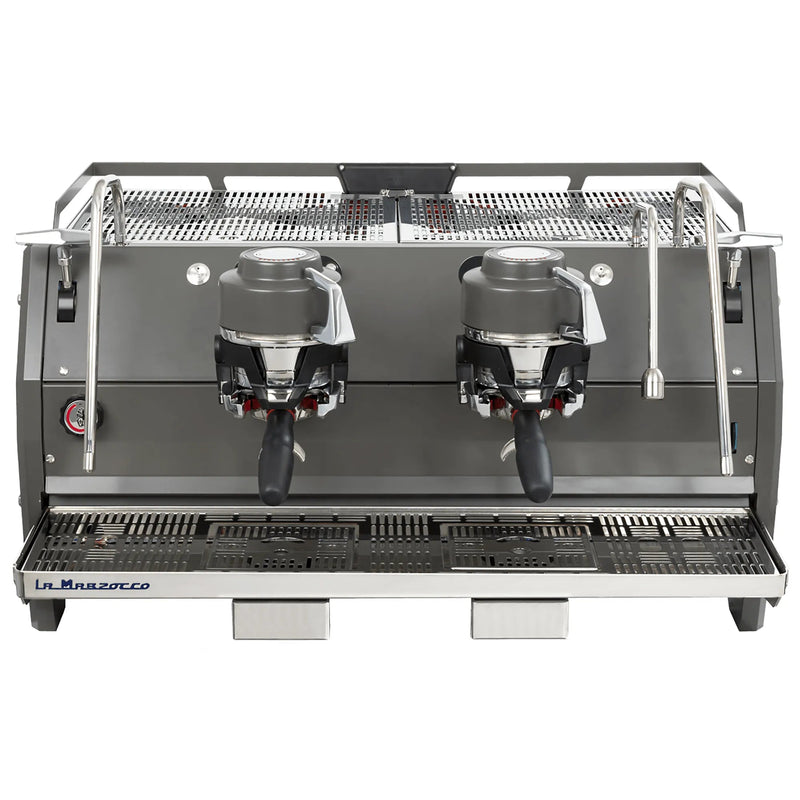 La Marzocco STRADA-X-2-GR two group espresso machine, front view of the dark body with exposed group heads and cup rail
