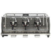 La Marzocco STRADA-X-3-GR three group espresso machine, front view of the dark body with three exposed group heads