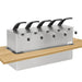Nemco 10966 drop-in condiment dispenser with five black pump handles, shown installed in a wooden countertop