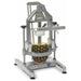 Nemco 55775 series Pineapple Corer/Peeler, aluminum frame with lever pressing down on a whole pineapple