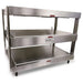 Nemco 6480 series heated pass through station with three flat stainless steel shelves and overhead heaters, angled view