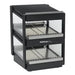 Nemco 6480 series heated pass through station with two slanted shelves in black finish, empty, angled front view