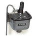 Nemco 77316 series stainless steel ice cream dipper well with faucet, black gasket rim and scoop, angled view
