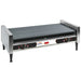 Nemco 8075 series stainless steel hot dog grill with 16 rollers on legs, no sneeze guard, angled front view