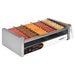 Nemco 8250 series slanted hot dog grill with digital controls, stainless steel, shown loaded with hot dogs, angled view