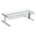 Nemco canopy sneeze guard with clear glass top and front panels on chrome plated stands, angled side view