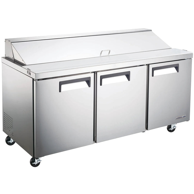 Nordic Air SPT-70-18 70-inch three door stainless steel refrigerated sandwich prep table with lid closed, on casters