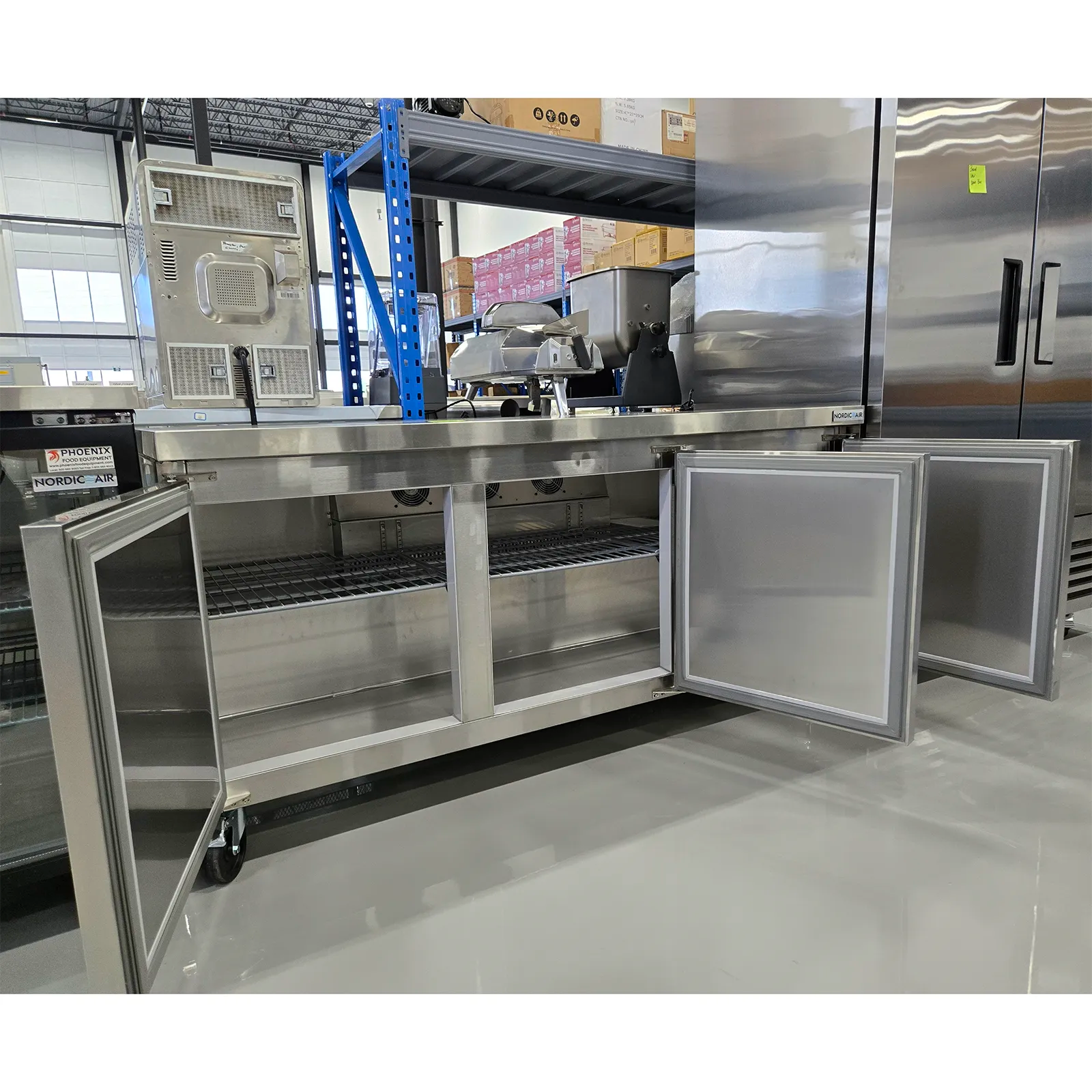 **OPEN BOX** Nordic Air Triple Door 72" Freezer Work Table-Phoenix Food Equipment