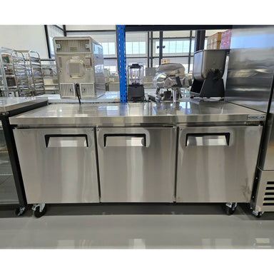 **OPEN BOX** Nordic Air Triple Door 72" Freezer Work Table-Phoenix Food Equipment