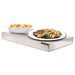 Omcan 20180 stainless steel plate warmer shown in use holding a plated meal and a casserole dish
