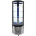Omcan 40440 round glass 4 tier 27-inch refrigerated cake display case shown empty with blue interior lighting