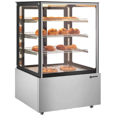 Omcan 48390 35-inch square glass floor display warmer with 3 shelves stocked with pastries, angled view
