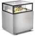 Omcan 48561 36-inch stainless steel flat top refrigerated pastry showcase stocked with cakes and desserts, angled view