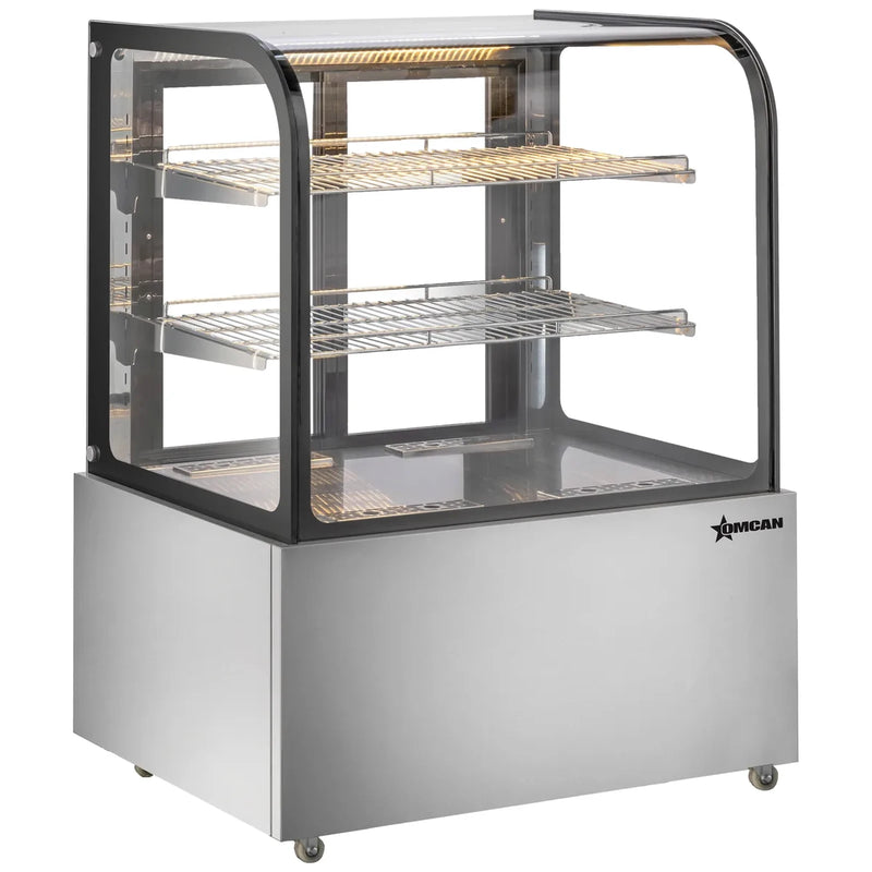 Omcan 49296 37-inch curved glass floor display warmer with 2 shelves and stainless steel base, angled view