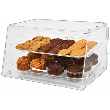 Omcan 80567 2-tray acrylic bakery display case stocked with muffins and cookies, angled view