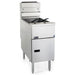 Pitco SG18S 70-90 lb gas floor fryer in stainless steel with twin fry baskets and cabinet door, angled view
