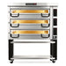 PizzaMaster PM73 electric 42-inch wide three deck pizza oven in stainless steel on a black stand with casters