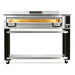 PizzaMaster PM84 electric 65-inch wide single deck pizza oven on a black and stainless steel stand with casters