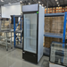 Scratch and dent Duracold P430WA 24-inch single glass door display refrigerator with lit header, front warehouse view