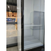 Scratch and dent Duracold P430WA single glass door display refrigerator, close-up of the glass door and interior shelf