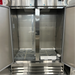 Open box Nordic Air SR-54 double door refrigerator, front view with both doors open and the new shelves still wrapped