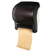 San Jamar T950TBK black pearl roll paper towel dispenser with lever handle dispensing brown towel, angled side view