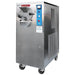 SaniServ B10-SAN 10 quart batch ice cream freezer in stainless steel with front barrel door, shown on casters