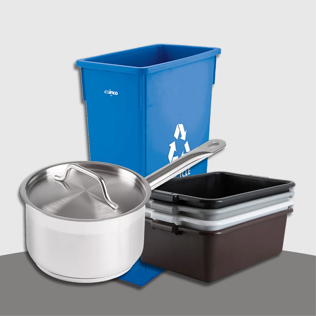 Stainless steel saucepan, blue recycling bin, and bus tubs