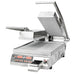 Star Pro-Max PST14D split top flat panini grill, angled view with one lid raised to show the smooth cooking surface