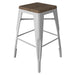 Tarrison Amelia indoor stackable backless metal stool in white with wood seat and footrest rungs, shorter size option