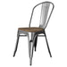 Tarrison Amelia indoor stackable metal side chair in clear-coat steel with wood seat and high curved back, angled view