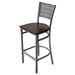 Tarrison Aria bar stool with silver metal frame, slotted back, footrest and dark walnut wood seat, angled view